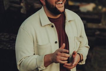 a man holding a phone