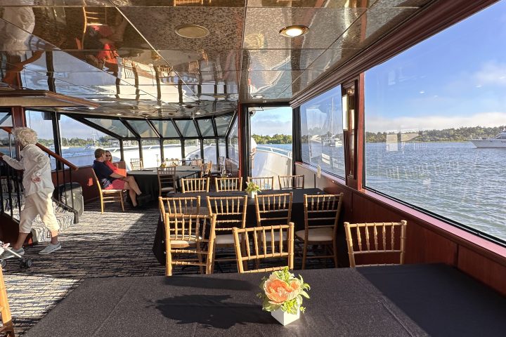 a group of people standing on a bridge