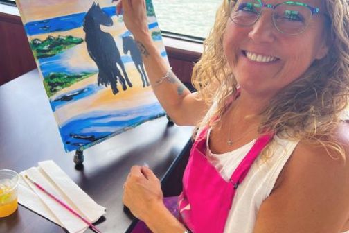 a woman sitting at a table