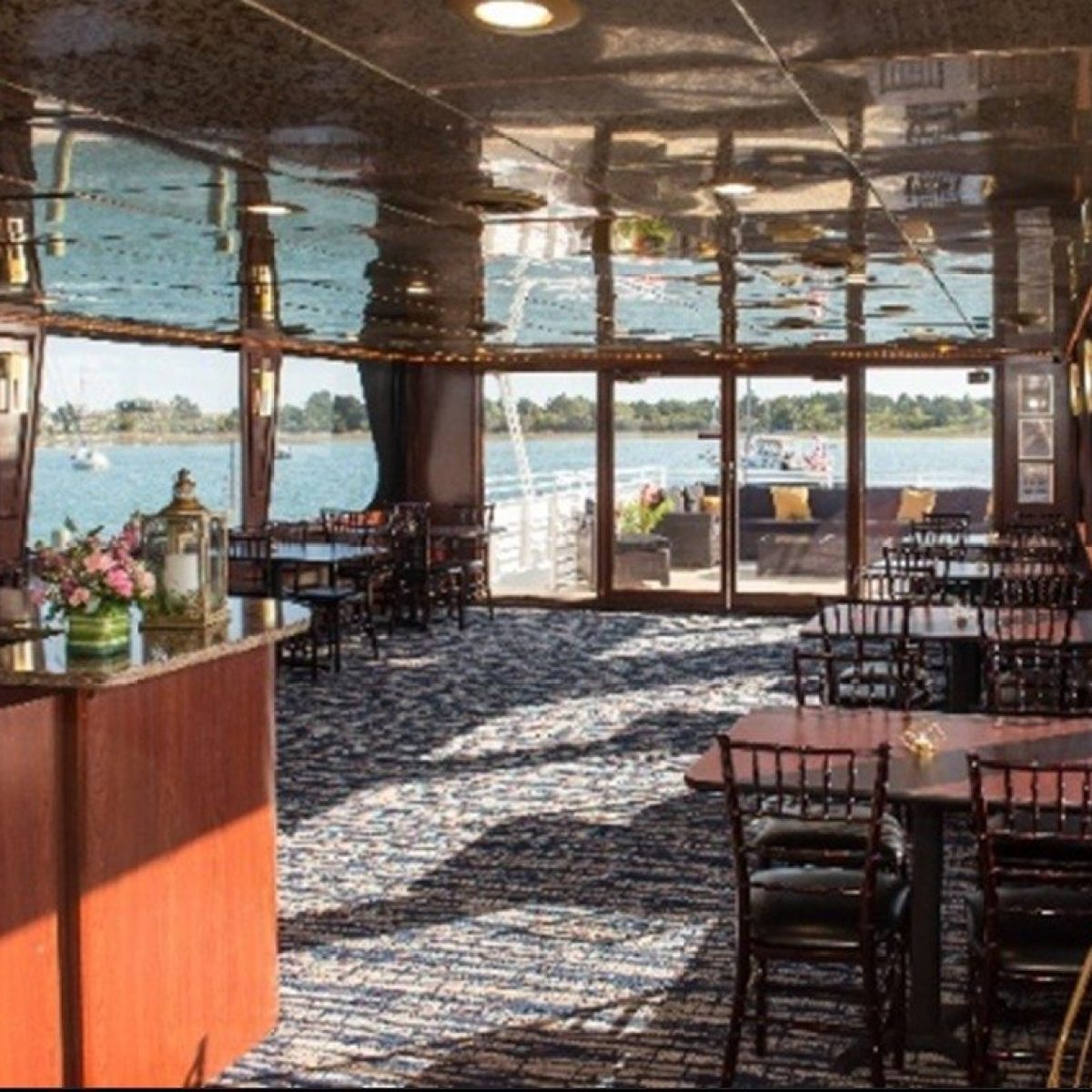 a room filled with furniture and a large window